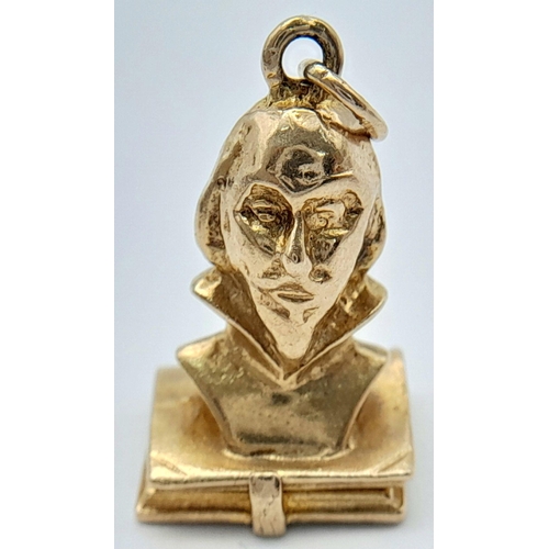 87 - A 9K YELLOW GOLD THE WORKS OF SHAKESPEARE BUST CHARM WHICH OPENS TO REVEAL THE LIST OF WORKS 2CM x 1... 