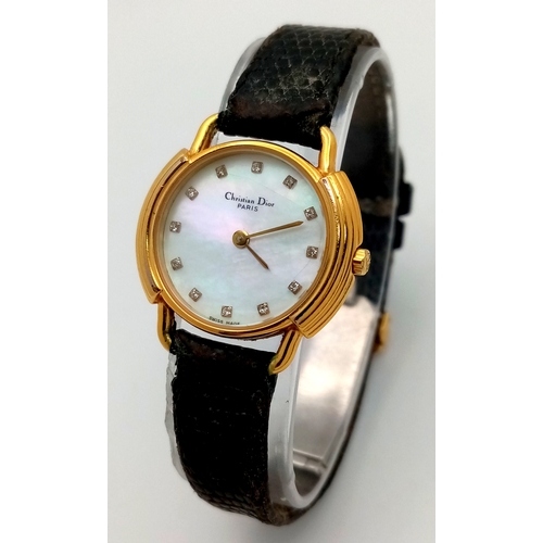 158 - A CHRISTIAN DIOR PARIS STRAP WATCH WITH MOTHER OF PEARL DIAMOND DOT DIAL - FULL WORKING ORDER. NEW B... 