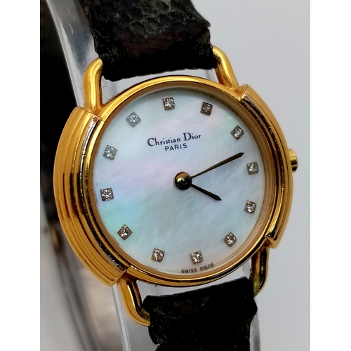 158 - A CHRISTIAN DIOR PARIS STRAP WATCH WITH MOTHER OF PEARL DIAMOND DOT DIAL - FULL WORKING ORDER. NEW B... 