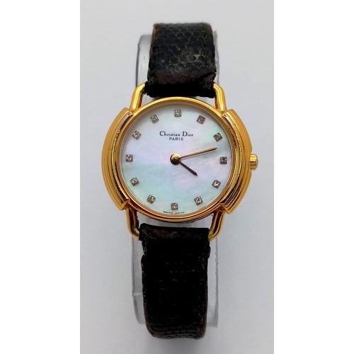 158 - A CHRISTIAN DIOR PARIS STRAP WATCH WITH MOTHER OF PEARL DIAMOND DOT DIAL - FULL WORKING ORDER. NEW B... 