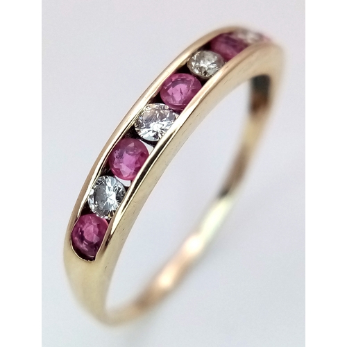 489 - A 9K YELLOW GOLD DIAMOND & RUBY 1/2 ET RING 1.3G TOTAL WEIGHT, SIZE P 1/2. Ref: SC 2022