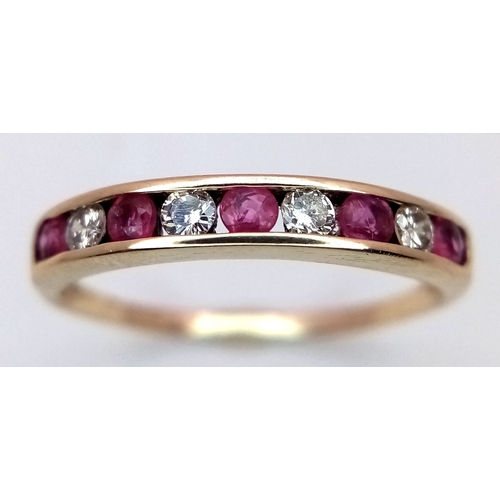 489 - A 9K YELLOW GOLD DIAMOND & RUBY 1/2 ET RING 1.3G TOTAL WEIGHT, SIZE P 1/2. Ref: SC 2022