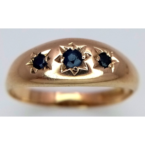 538 - A 9K YELLOW GOLD SAPPHIRE RING 1.6G TOTAL WEIGHT, SIZE M. Ref: SC 2010