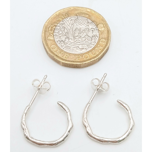 1049 - A PAIR OF STERLING SILVER BARKED EFFECT HOOP EARRINGS, 1.7G. RPM2006