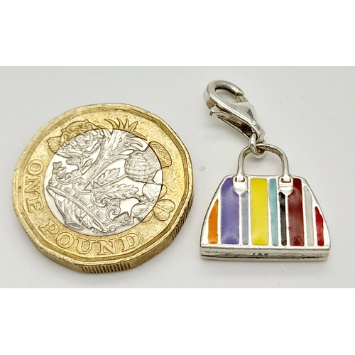 1070 - A STERLING SILVER ENAMELLED HANDBAG CHARM. 4.4G. RPM2017.