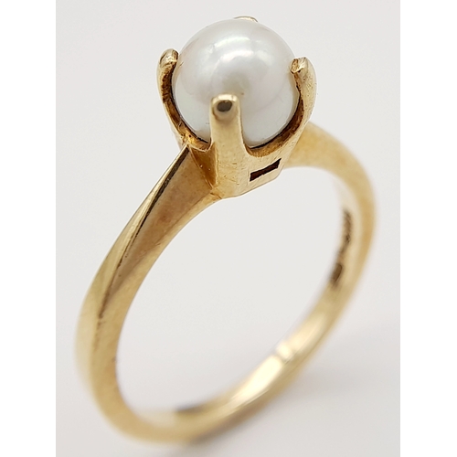 168 - Impressive 10 CARAT GOLD RING having SINGLE PEARL mounted to top. 2.85 grams. Size N.