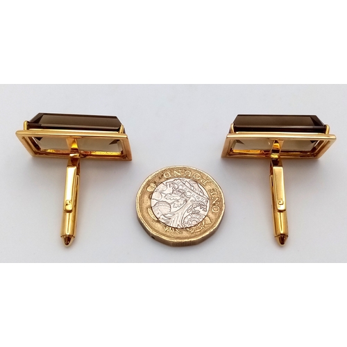 30 - A Pair of 14k Gold and Large Rectangular Cut Smoky Quartz Cufflinks. 21.4g total weight. With case.