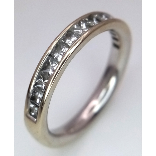 553 - Elegant 18 CARAT GOLD and DIAMOND RING. Consisting a fully hallmarked Yellow GOLD BAND with 14 Princ... 