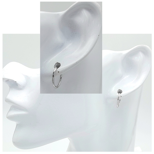 579 - A PAIR OF 9K WHITE GOLD OVAL SLEEPER HOOP EARRINGS 1.1G TOTAL WEIGHT, 1.1CM DIAMETER. Ref: SC 2023