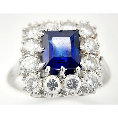 603 - A Vintage Silver Sapphire and Diamond Set Ring Size L. The Ring is set with a 6mm Square Cut Blue Sa... 