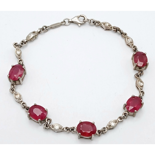 642 - A Vintage 925 Silver Red Stone Bracelet and Earring Set.