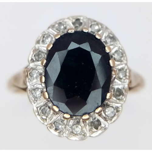 679 - A Beautiful 9 CARAT GOLD ,SPINEL and DIAMOND RING in Classic ‘DIANA’ Style. Having an oval cut SPINE... 