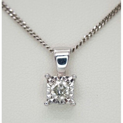 68 - AN 18K WHITE GOLD DIAMOND SOLITAIRE PENDANT ON AN 18