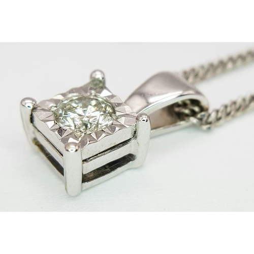 68 - AN 18K WHITE GOLD DIAMOND SOLITAIRE PENDANT ON AN 18