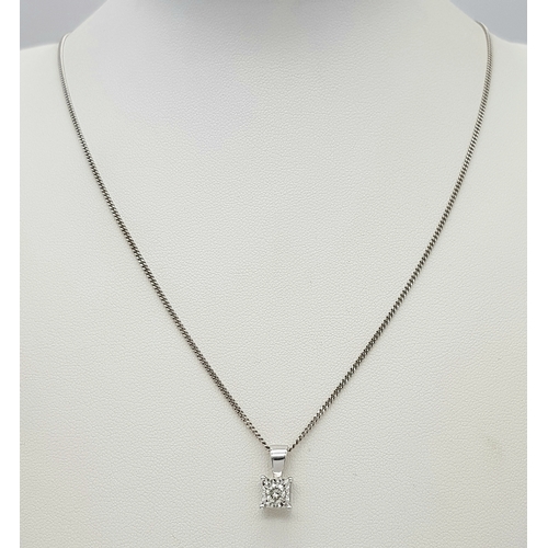 68 - AN 18K WHITE GOLD DIAMOND SOLITAIRE PENDANT ON AN 18