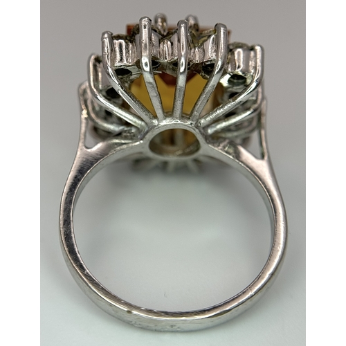 760 - An Impressive Danish Silver Citrine and Clear Stone Ring Size M. The Ring is Set with a 1.2cm Long R... 