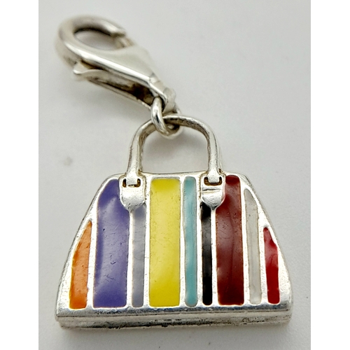 1070 - A STERLING SILVER ENAMELLED HANDBAG CHARM. 4.4G. RPM2017.