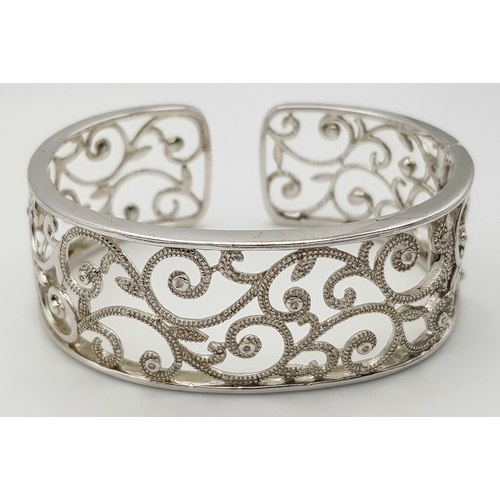 1086 - Two Stylish Solid Silver 925 Bangles, Foliate Design Hinged Torque and Safety Chain, Total weight: 5... 