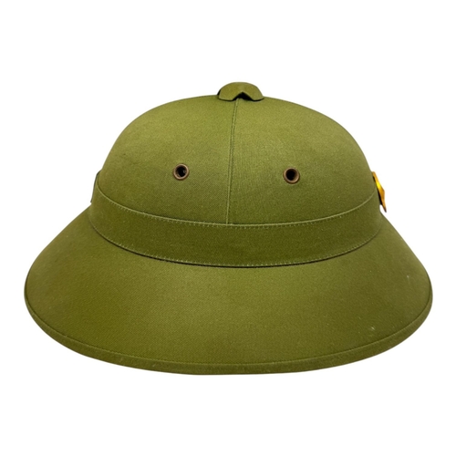 1337 - A Vietnam war era Vietcong Helmet with original strap and badge.
Some minor wear but no visible stai... 