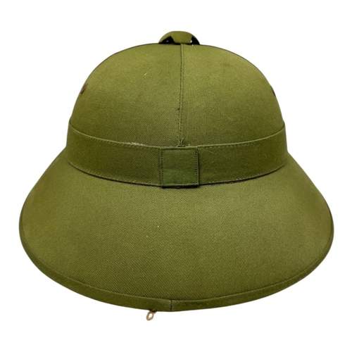 1337 - A Vietnam war era Vietcong Helmet with original strap and badge.
Some minor wear but no visible stai... 