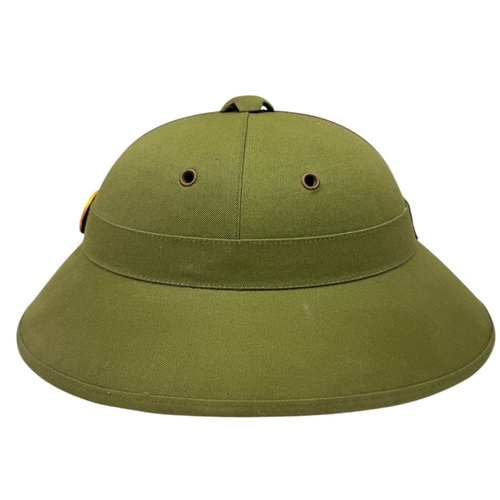 1337 - A Vietnam war era Vietcong Helmet with original strap and badge.
Some minor wear but no visible stai... 