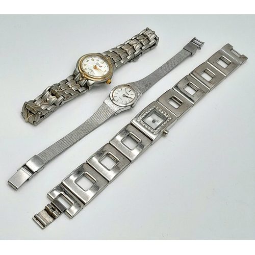 1069 - A Parcel of three good Ladies sports, dress and fashion watches comprising; 1) A Two Tone Swiss Skie... 