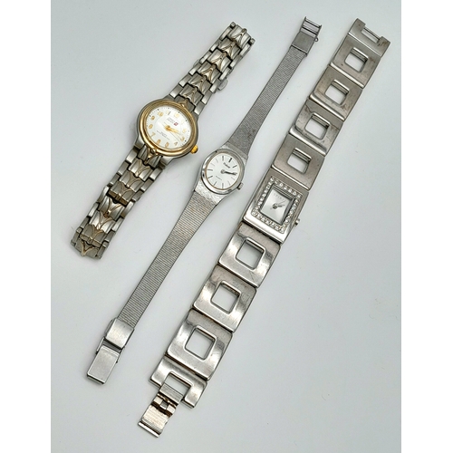 1069 - A Parcel of three good Ladies sports, dress and fashion watches comprising; 1) A Two Tone Swiss Skie... 