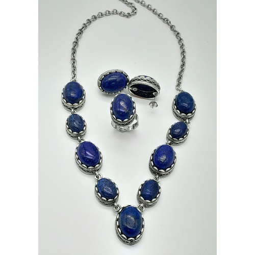 1551 - A Lapis Lazuli jewellery suite featuring a necklace, a matching ring and a pair of earrings. Necklac... 