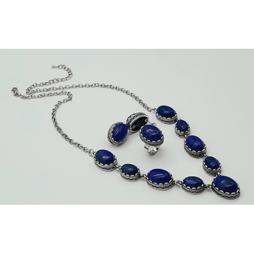 1551 - A Lapis Lazuli jewellery suite featuring a necklace, a matching ring and a pair of earrings. Necklac... 