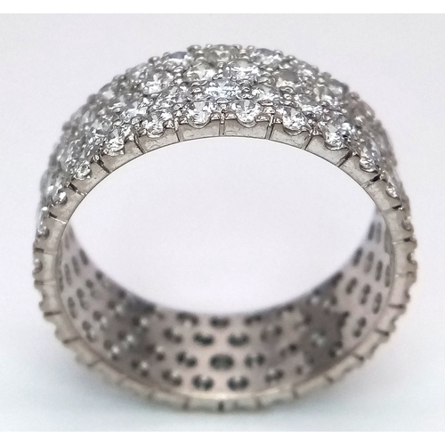 515 - A WGI Certified 14K White Gold (tested) Diamond Eternity Ring. Four rows set with 112 brilliant roun... 