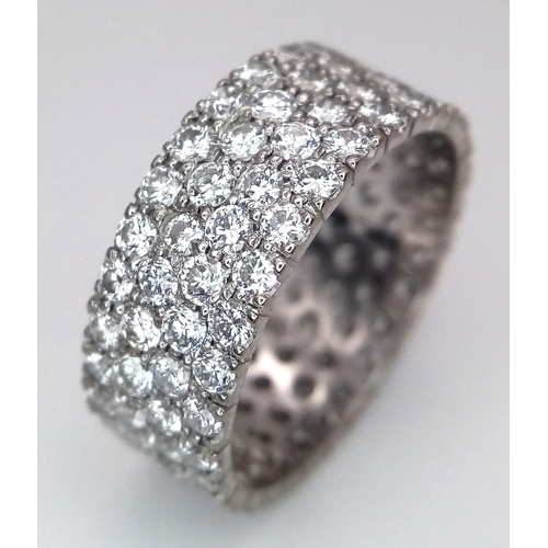 515 - A WGI Certified 14K White Gold (tested) Diamond Eternity Ring. Four rows set with 112 brilliant roun... 