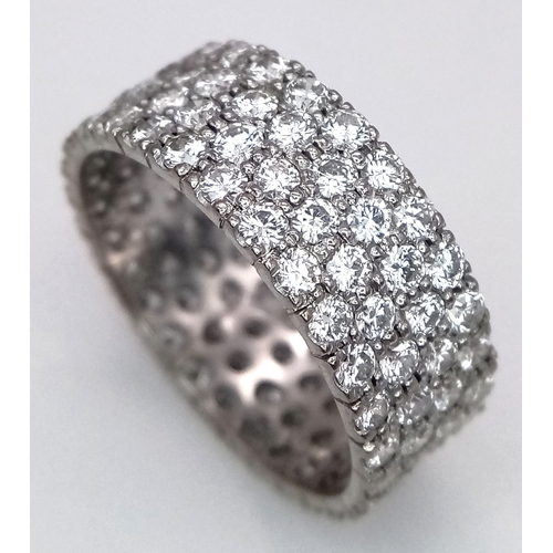 515 - A WGI Certified 14K White Gold (tested) Diamond Eternity Ring. Four rows set with 112 brilliant roun... 