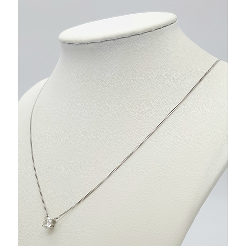 529 - A WGI Certified 18K White Gold and Diamond Pendant on an 18K White Gold Chain. 0.78 brilliant round ... 