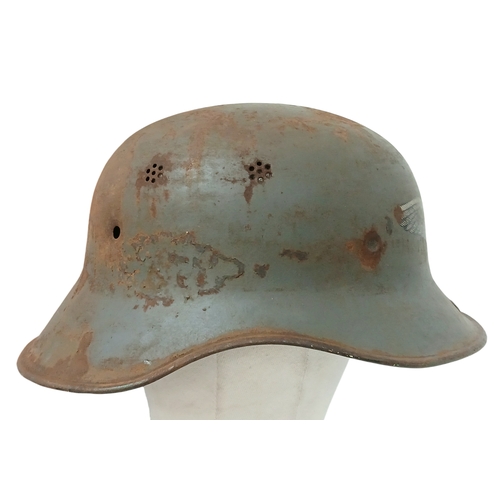 1213 - A WW2 German Luftschutz Helmet (air raid police) No Liner. There is an extra hole drilled in the pea... 