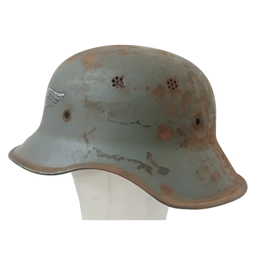 1213 - A WW2 German Luftschutz Helmet (air raid police) No Liner. There is an extra hole drilled in the pea... 