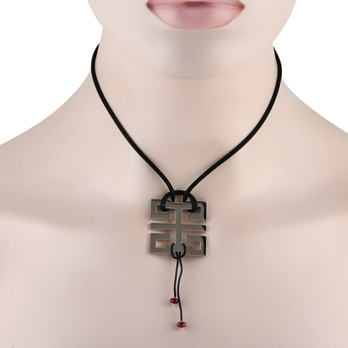 1665 - An Cartier Le Baiser du Dragon 18K White Gold Pendant Necklace. Suspended from a 24 black silk cord,... 