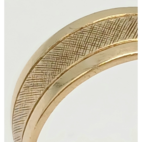 12 - A Vintage 14K Yellow Gold Smooth and Textured Band Ring. 8mm width. Size O. 4.3g