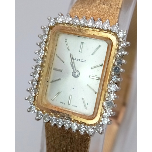 144 - A Vintage Baylor 9K Gold and Diamond Ladies Watch. 9K gold bracelet and case - 21mm. 40 round cut di... 