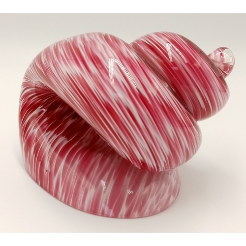 146 - A vintage, large, hand-made and mouth-blown, cranberry and white glass snail paperweight, made by
WE... 