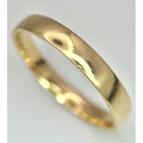 17 - A 9K Yellow Gold Very Large Band Ring. Full UK hallmarks. 4mm width. Size Z+2. 3.9g