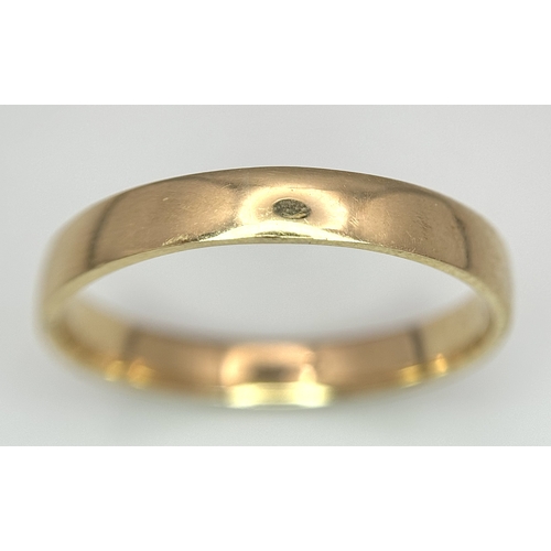 17 - A 9K Yellow Gold Very Large Band Ring. Full UK hallmarks. 4mm width. Size Z+2. 3.9g