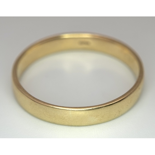 17 - A 9K Yellow Gold Very Large Band Ring. Full UK hallmarks. 4mm width. Size Z+2. 3.9g