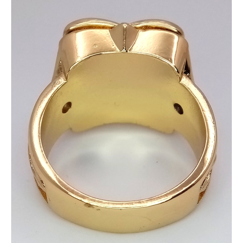 174 - An interesting gold-filled gent’s ring with a single cubic zirconium and a secret compartment for th... 