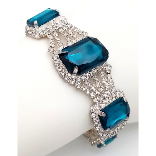 195 - A glamorous dress bracelet with cubic zirconia and synthetic tanzanite, in a presentation box. One s... 