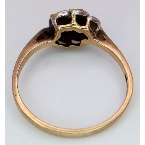 26 - A Vintage 9K Yellow Gold Diamond and Sapphire Crossover Ring. Size N 1/2. 2g.