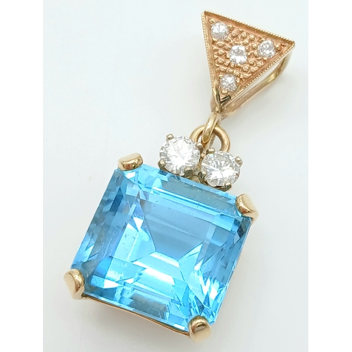 36 - A Head-Turning 18K Gold, Blue Topaz and Diamond Pendant and Earring Set. A 10ct princess cut ice blu... 