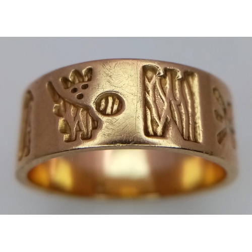 5 - A 14K Yellow Gold Celtic Band Ring. 7mm width. 5.8g