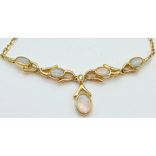 54 - A Gorgeous Italian 18K Gold and Opal Lavaliere Necklace. Five opal cabochons with excellent colour-p... 