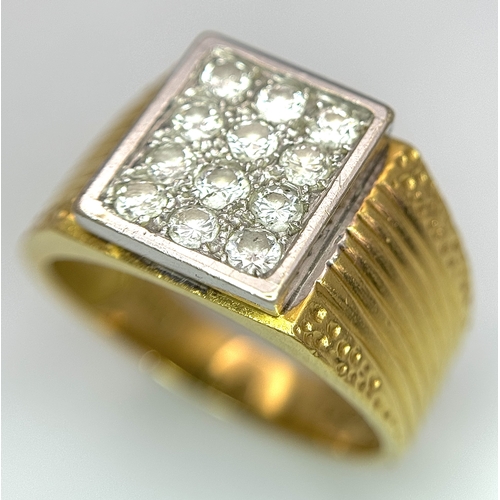 68 - An 18K Yellow Gold Twelve Diamond Signet Dress Ring. Beautifully constructed with ridge and dimple e... 