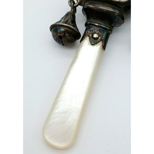 882 - A Vintage Silver Mr Punch Baby Rattle with Mother of Pearl Handle. Hallmarks for Birmingham, 1941. 7... 